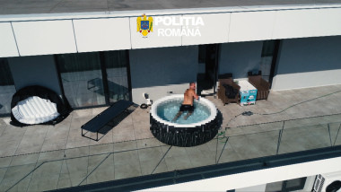 Român urmărit internațional arestat într-o piscină gonflabilă de pe terasa apartamentului său